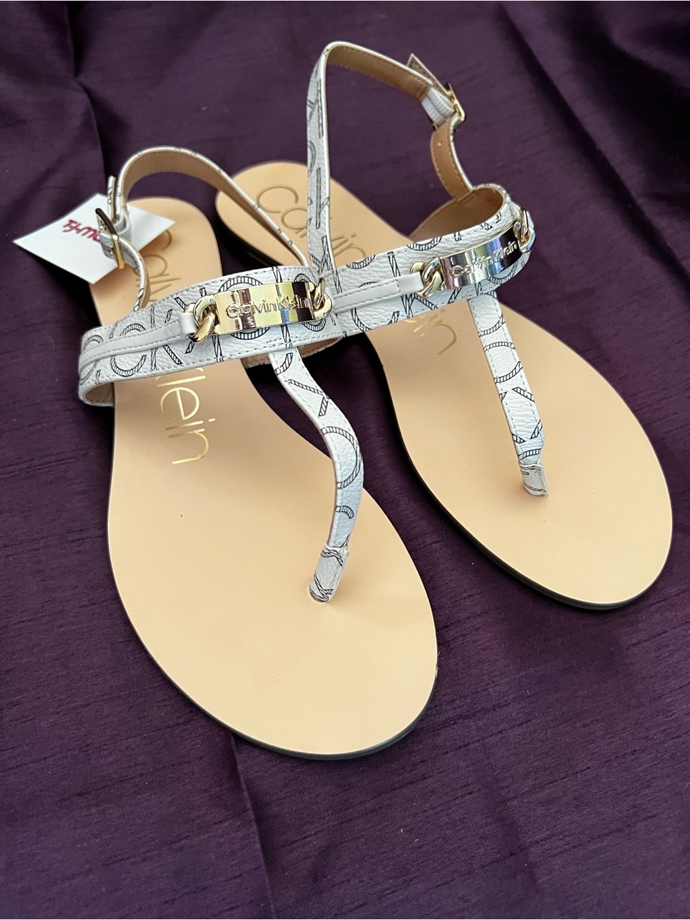 Calvin Klein White Logo Print T-Strip Sandals with Gold Accent